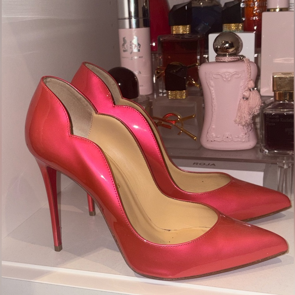 CHRISTIAN LOUBOUTIN
Hot Chick 110 patent leather pumps